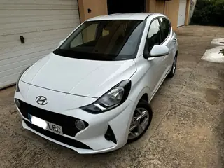 Hyundai i10 white, front side view